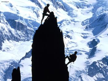 Rock Climbers Silhouetted By Mt Blanc France screenshot